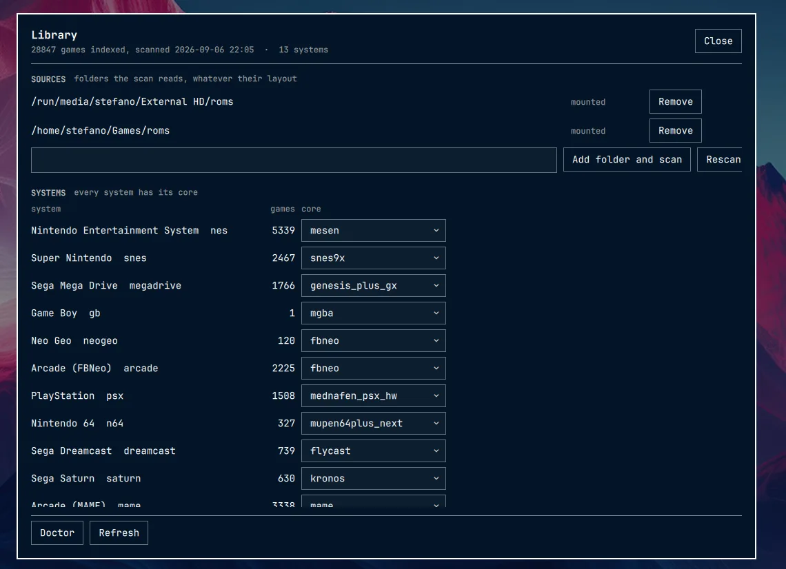 A full screen overlay listing the folders the scan reads and every system with its emulator core.